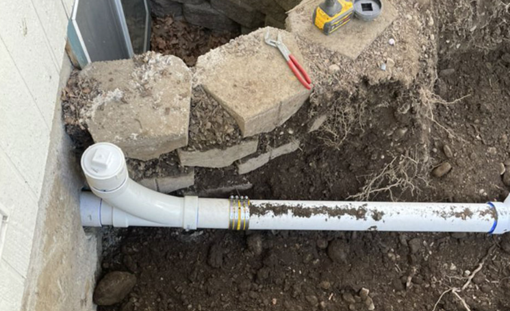 Sewer line replacement in trench
